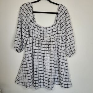 Title:
Elegant Black & White Checkered Puff Sleeve Dress – NWT